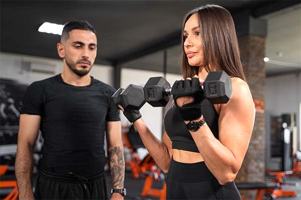 Woman working out with dumbbells