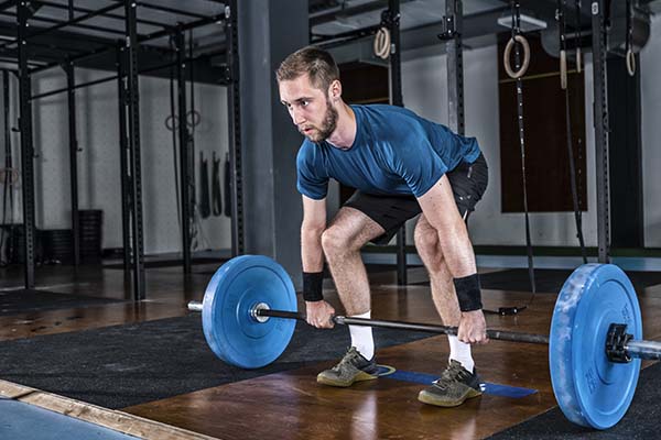 Man in the gym weightlifting