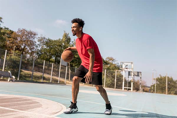 Boy playing basket ball 
