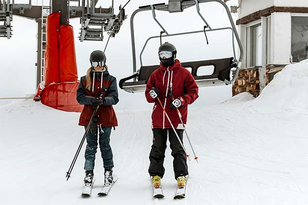 skiers near chairlift