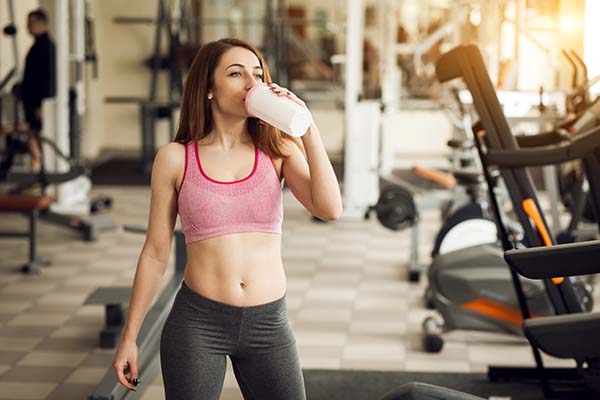 Woman drinking a protein shake