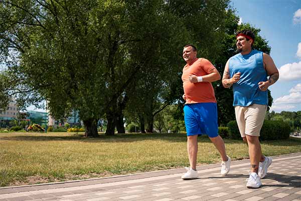 men exercising together outdoors