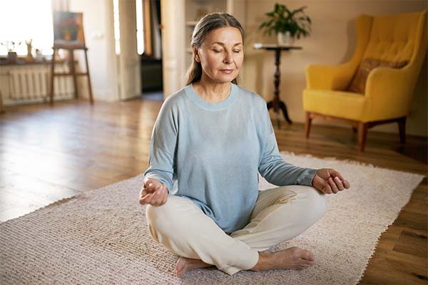 Fitness Tips: Expressive senior female posing indoor