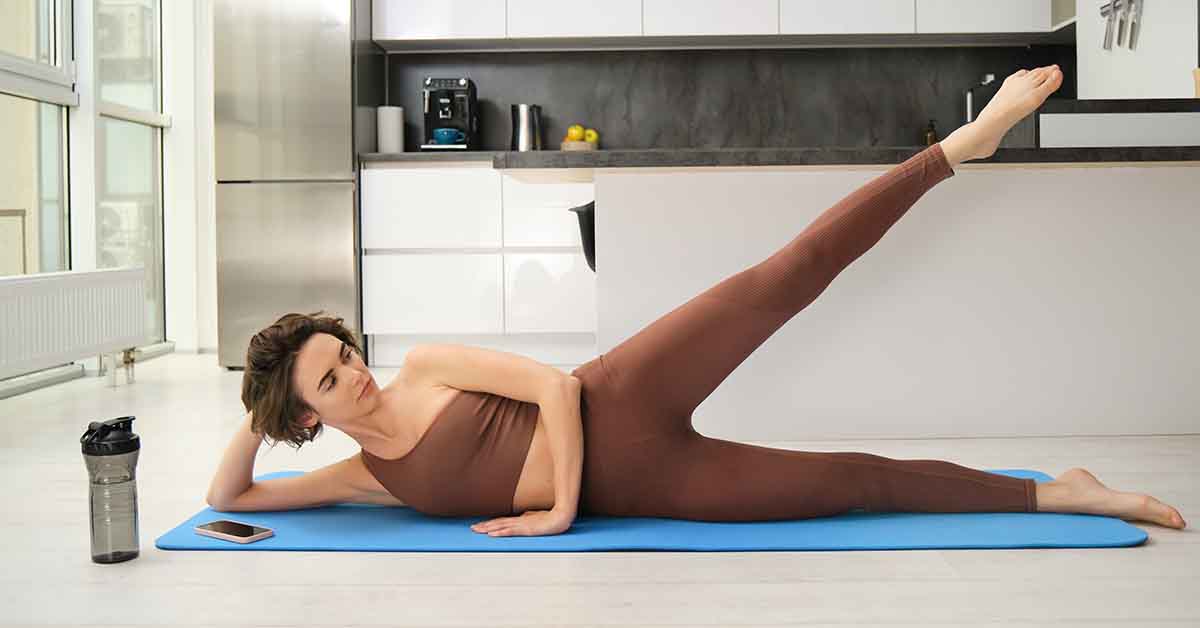 Woman practicing dynamic stretching