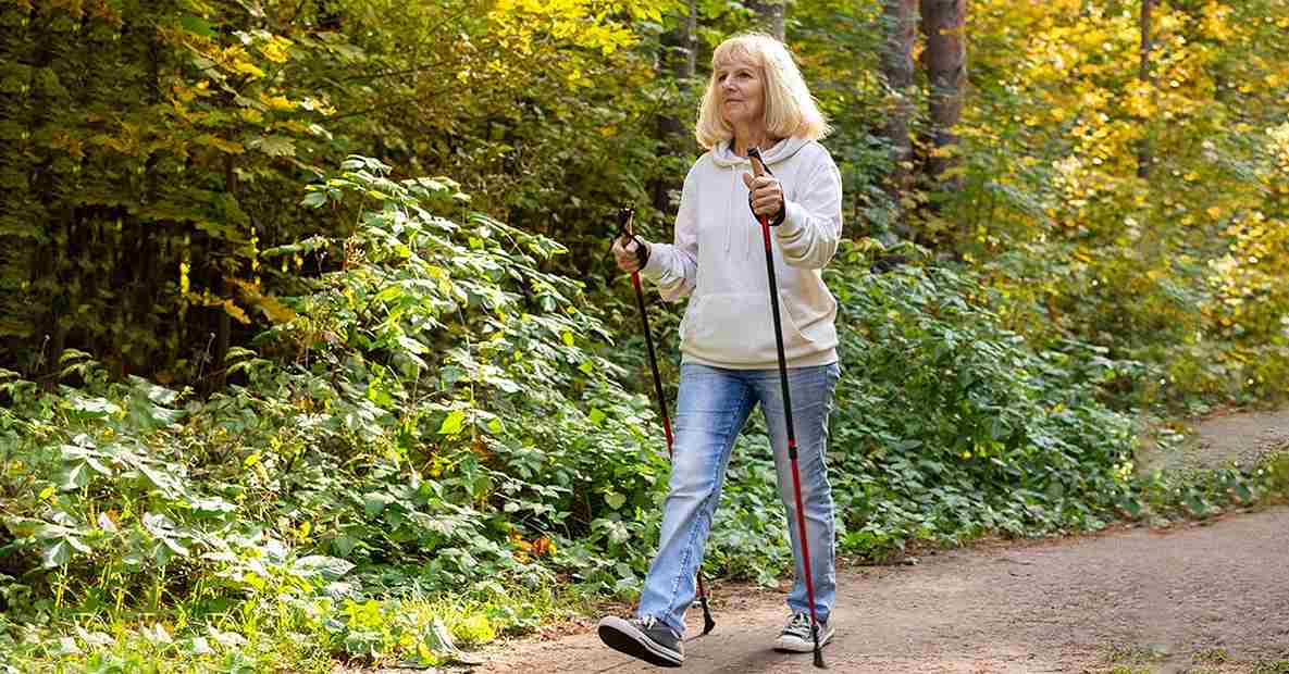 Older woman pole walking