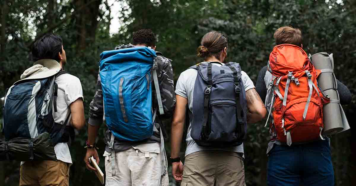 Trekking together in a forest
