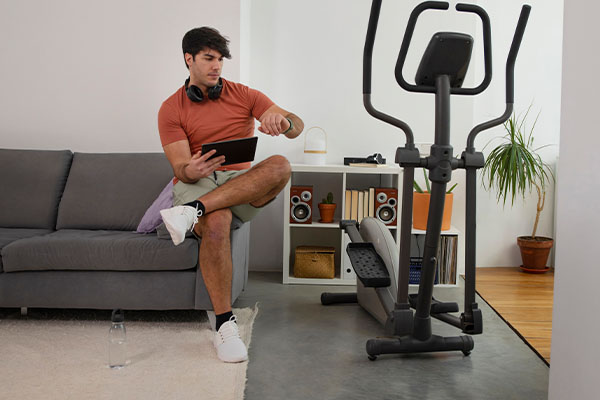 man with exercise bike at home