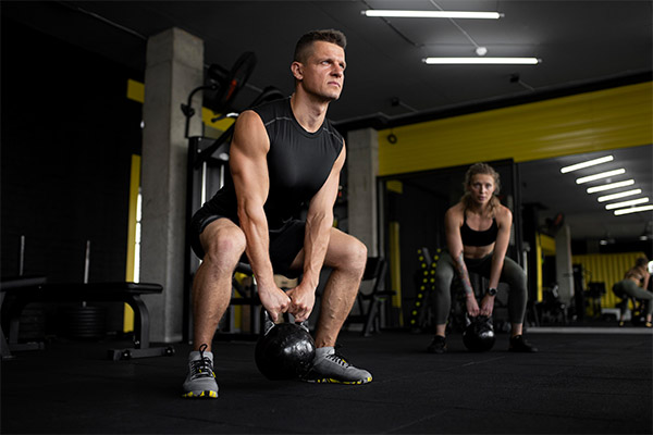 A man cross-training at the gym