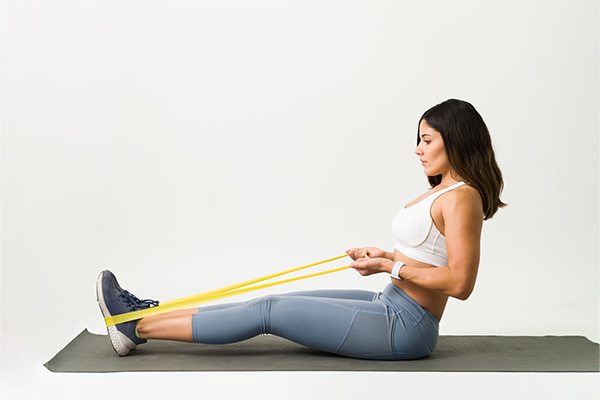 Woman working out with a resistance band
